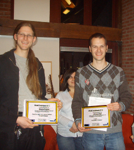 Matthijs and Christiaan showing their award